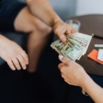 who pays debt in a divorce